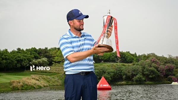 Alex Fitzpatrick celebrates victory at the Hero Indian Open