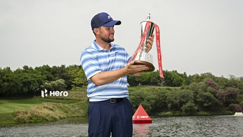 Alex Fitzpatrick celebrates victory at the Hero Indian Open
