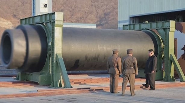 North Korea's Kim Jong Un inspects solid-fuel missile engine