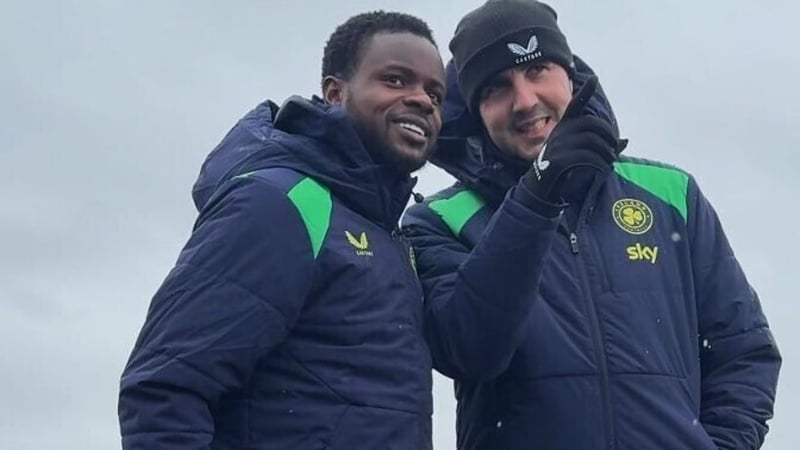 Millenic Alli, left, in conversation with Republic of Ireland assistant manager John O'Shea