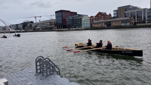 Currach boat on River Liffey