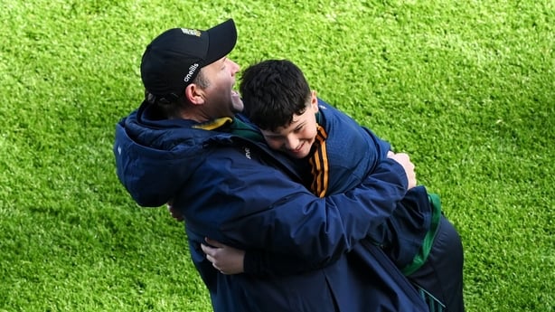 29 March 2026; Meath manager Robbie Brennan celebrates with his son Kyle after the Allianz Football League Division 2 final match between Meath and Cork at Croke Park in Dublin. Photo by Ramsey Cardy/Sportsfile
