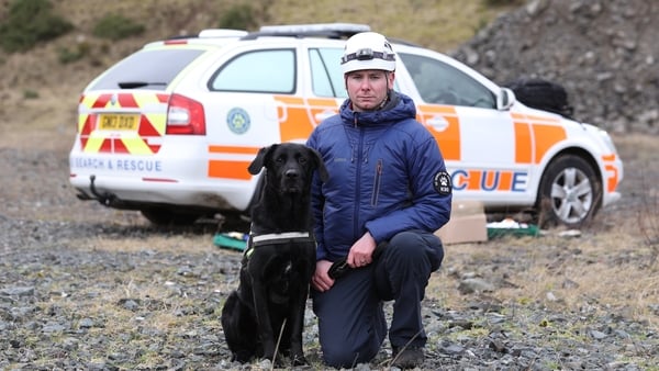 K9 Search and Rescue NI team leader, Ryan Gray with dog Max at the Wolf Hill quarry, Belfast