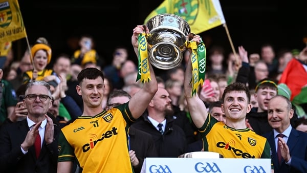 29 March 2026; Donegal captains Michael Langan, left, and Michael Langan lift the Corn Mhíchíl Uí Mhuircheartaigh after their side's victory in the Allianz Football League Division 1 final match between Kerry and Donegal at Croke Park in Dublin. Photo by