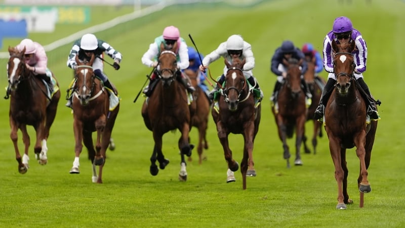 NEWMARKET, ENGLAND - OCTOBER 10: Christophe Soumillon riding Precise (R, purple) win The bet365 Fillies' Mile at Newmarket Racecourse on October 10, 2025 in Newmarket, England. (Photo by Alan Crowhurst/Getty Images)