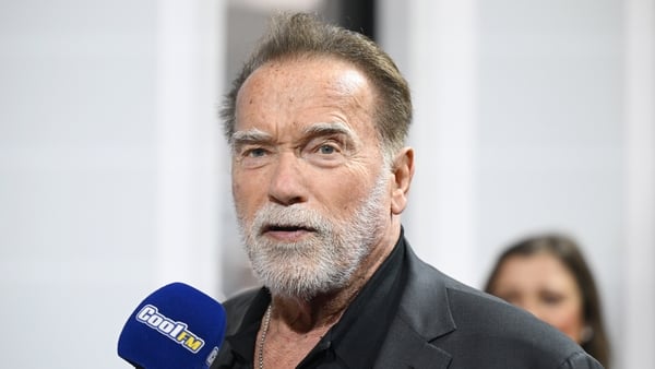 Arnold Schwarzenegger is interviewed as he arrives for a ceremony to receive a honorary doctorate at Ulster University on March 30, 2026 in Belfast, Northern Ireland