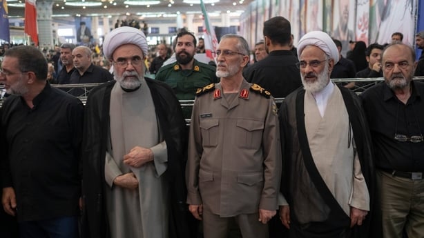 Brigadier General Mohammad Shirazi, Head of the Office of the Commander-in-Chief of the Iranian Armed Forces in Military Affairs, attends a memorial ceremony for IRGC commanders, nuclear scientists, and civilians killed in the Iran-Israel war at the Imam Khomeini Grand Mosque in downtown Tehran, Ira