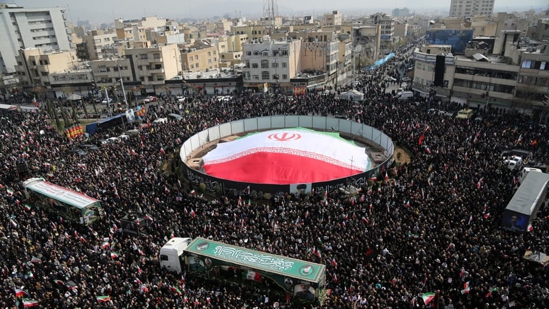 Thousands gather at Enghelab Square to attend the funeral ceremony for Iranian commanders killed in U.S. and Israeli attacks in Tehran, Iran, on March 11, 2026. The coffins of senior military officials as well as children killed in the attacks are brought