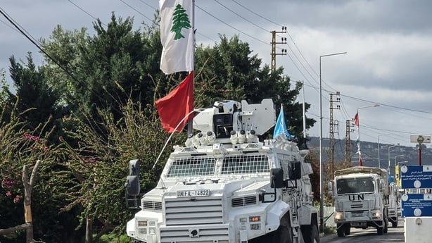 United Nations peacekeepers with the UN Interim Force in Lebanon drive past a Lebanese army outpost in the area of Naqura in southern Lebanon