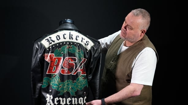 Propstore's music specialist Mark Hochman looks at George Michael's photo-matched 'Faith' music video and tour custom La Rocka leather jacket (est. �60,000 - �120,000) during a photocall for the upcoming Music Live Auction, at the Propstore in Rickmansworth, Hertfordshire. The auction, to be held on