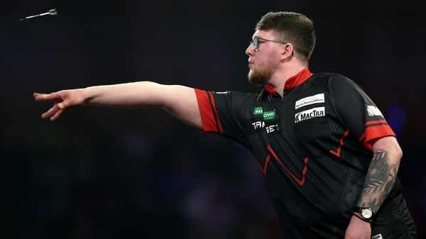 LONDON, ENGLAND - DECEMBER 21: Keane Barry of Ireland throws against Martin Schindler of Germany (not pictured) during the Round Two match between Martin Schindler and Keane Barry during Day Eleven of the 2025/26 Paddy Power World Darts Championship at Al