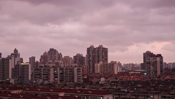 SHANGHAI, CHINA - JULY 29, 2025 - The clouds above the city skyline are purple due to Severe Tropical Storm Co-may in Shanghai, China on July 29, 2025. (Photo credit should read CFOTO/Future Publishing via Getty Images)
