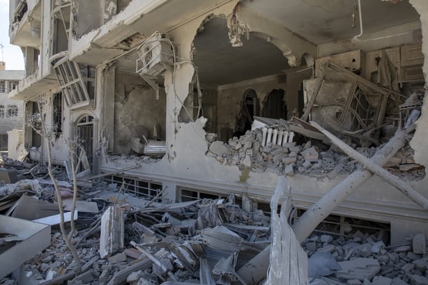 TEHRAN, IRAN - MARCH 30: Debris tumbles from a residential building hit in an airstrike earlier this morning on March 30, 2026 in the west of Tehran, Iran. The United States and Israel have continued their joint attack on Iran that began on February 28. Iran retaliated by firing waves of missiles an