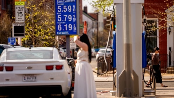 WASHINGTON, DC - MARCH 31: Gas prices over five dollars a gallon are displayed at an Exxon gas station near the U.S. Capitol Building on March 31, 2026 in Washington, DC. The national average of one gallon of gas has risen to roughly $4.02 amid the ongoin
