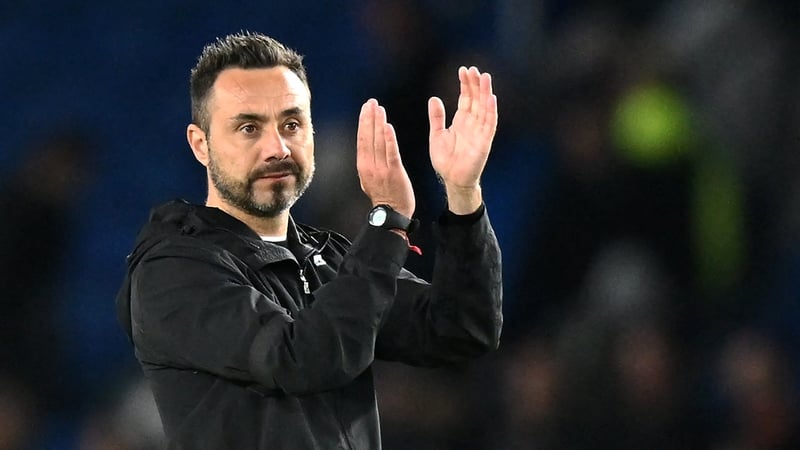 Brighton's Italian head coach Roberto De Zerbi claps the fans after the English Premier League football match between Brighton and Hove Albion and Tottenham Hotspur at the American Express Community Stadium in Brighton, southern England on October 8, 2022