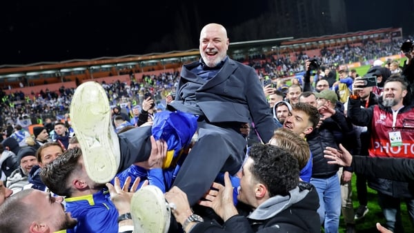 ZENICA, BOSNIA AND HERZEGOVINA - MARCH 31: Sergej Barbarez, Head Coach of Bosnia and Herzegovina, is lifted by his team as they celebrate victory and qualification for FIFA World Cup 2026 during the FIFA World Cup 2026 European Qualifiers KO play-offs mat