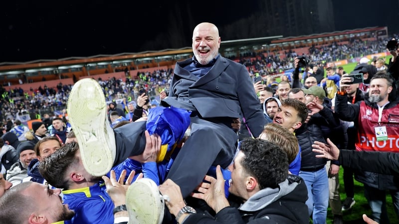 ZENICA, BOSNIA AND HERZEGOVINA - MARCH 31: Sergej Barbarez, Head Coach of Bosnia and Herzegovina, is lifted by his team as they celebrate victory and qualification for FIFA World Cup 2026 during the FIFA World Cup 2026 European Qualifiers KO play-offs mat