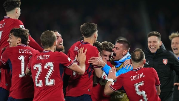 Czechia players celebrate their penalty shootout victory over Denmark. The result means they qualify for a first World Cup since 2006