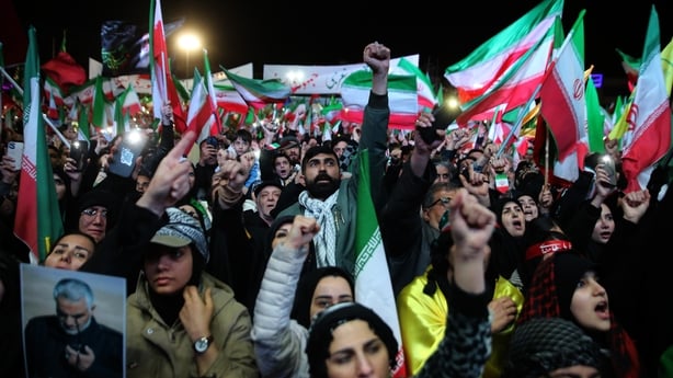 TEHRAN, IRAN - MARCH 31: Crowds gather in Enghelab Square, to mark Islamic Republic Day and show support for the government, waving Iranian flags and chanting slogans against the United States and Israel, in Tehran, capital of Iran, on March 31, 2026. (Photo by Fatemeh Bahrami/Anadolu via Getty Imag