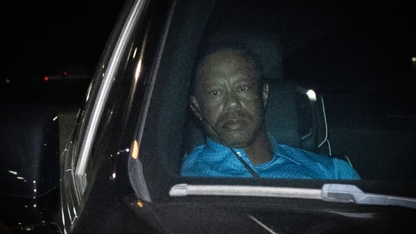 Tiger Woods is seen leaving Martin County Jail after being arrested for driving under the influence
