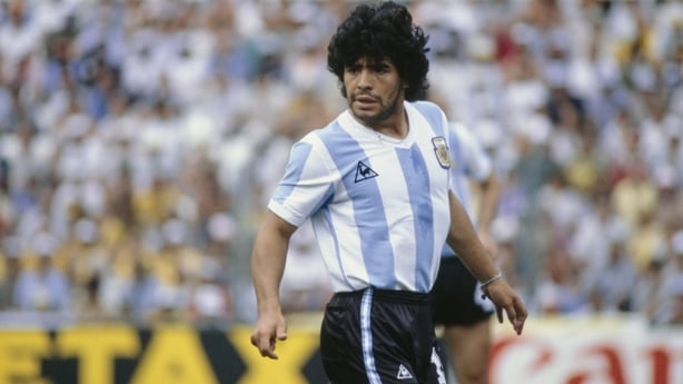 A photograph of argentine football player Diego Armando Maradona during a match in the 1982 FIFA World Cup