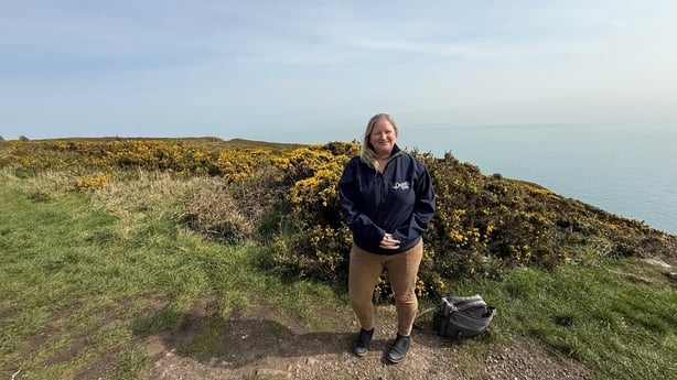 a photograph of Failte Ireland regional manager Helen Cole on Howth summit walk