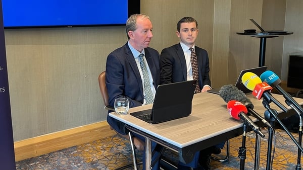 Peter Corrigan (L) & Darragh Mackin (R) of Phoenix Law at the news conference