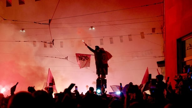 Supporters of Bosnia-Herzegovina's national soccer team gather to celebrate in the early hours of April 1, 2026 in downtown Sarajevo after Bosnia-Herzegovina qualified for the FIFA World Cup 2026, following its win over Italy in the European qualification final football match played at the Bilino-Po