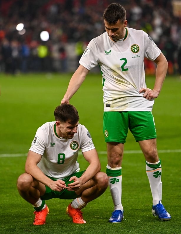 16 November 2025; Jayson Molumby, left, and Seamus Coleman of Republic of Ireland celebrate after the FIFA World Cup 2026 Group F Qualifier match between Hungary and Republic of Ireland at Puskás Aréna in Budapest, Hungary. Photo by Ben McShane/Sportsfile