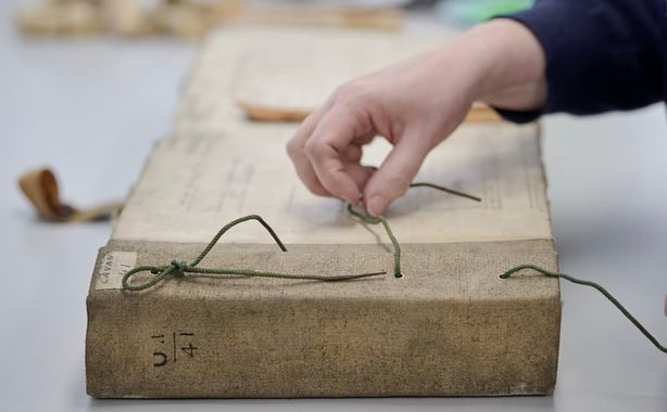 Image of the canvas-bound volumes the 1926 Census was stored in