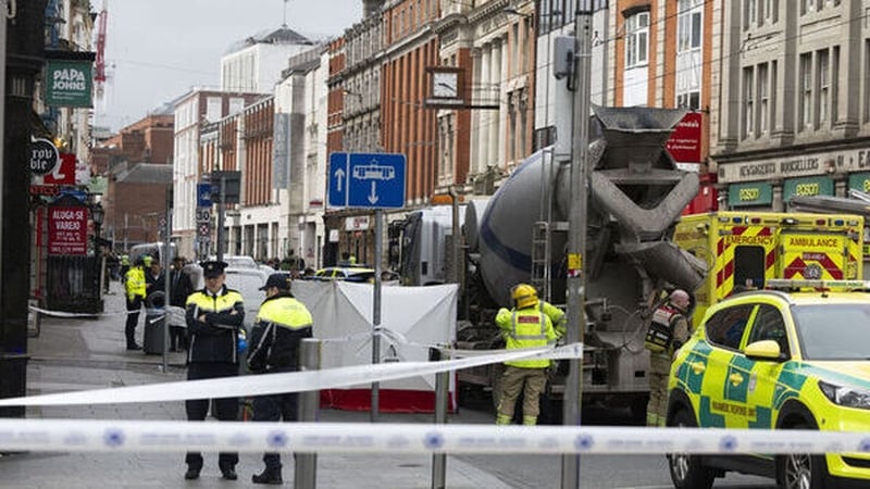 Emergency Services at a traffic incident involving a Cement mixer on Middle Abbey St, Dublin