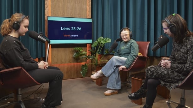 Three young people sitting in the RTÉ podcast on a visit as part of Vision Ireland's TY LENS programme.