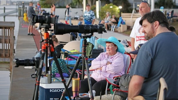 Space enthusiasts wait to watch the launch of ARTEMIS II