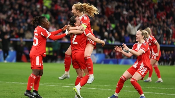 MUNICH, GERMANY - APRIL 01: Glodis Perla Viggosdottir of FC Bayern Muenchenc elebrates as she scores the goal 1:1 with Vanessa Gilles of FC Bayern Muenchen with Bernadette Kakounan of FC Bayern Muenchen during the UEFA Women's Champions League 2025/26 Quarter-finals First Leg match between Mancheste
