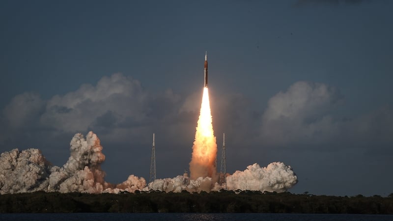 NASA's Artemis II Space Launch System rocket carrying the Orion spacecraft lifts off from Launch Complex at the Kennedy Space Center in Cape Canaveral, Florida.