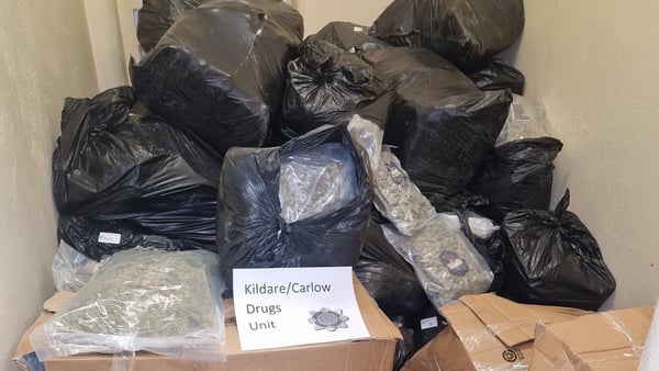 photo shows packages of cannabis displayed on a table