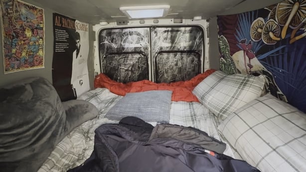 Interior shot of a bed inside a van
