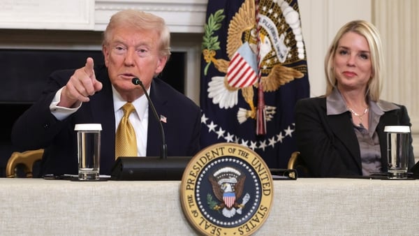 US President Donald Trump pictured alongside Attorney General Pam Bondi in October 2025