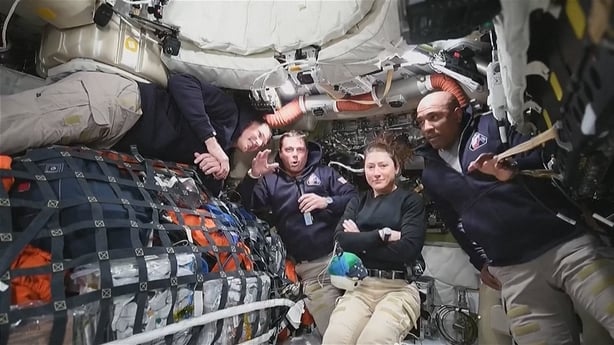 The astronauts on board the spacecraft