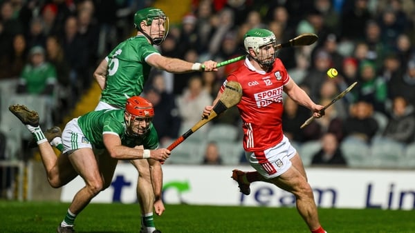 Shane Kingston of Cork races clear of William O'Donoghue (6) and Barry Nash of Limerick - Allianz Hurling League, March 2026
