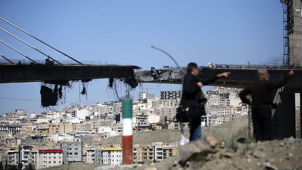 Significant sections of the B1 Bridge are seen destroyed after an airstrike attributed to the United States and Israel targeted the site near Tehran