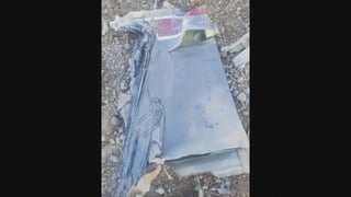 Fragments of a downed US fighter jet in central Iran