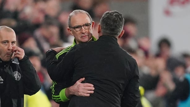Celtic manager Martin O'Neill hugs Heart of Midlothian manager Derek McInnes 