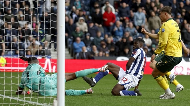 WEST BROMWICH, ENGLAND - APRIL 3: Arthur Okonkwo of Wrexham AFC makes a point blank reaction save to deny Daryl Dike of West Bromwich Albion as he shoots at goal in the final moments of the match during the Sky Bet Championship match between West Bromwich Albion and Wrexham AFC at The Hawthorns on A