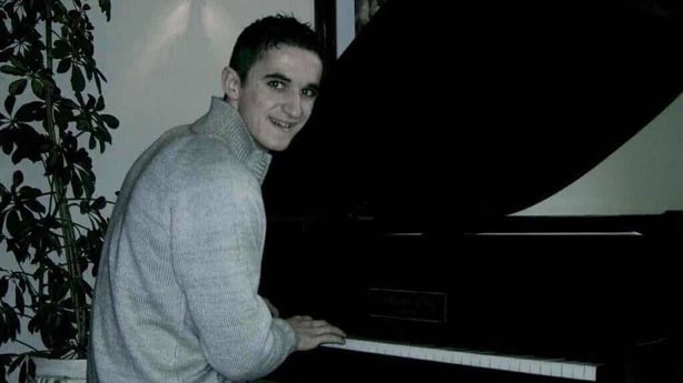 Darren Price playing the piano