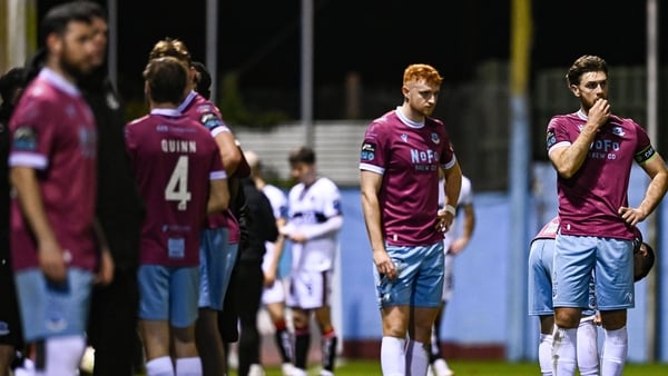 3 April 2026; Drogheda United players, including Conor Keeley, right, and James Bolger look on concerned about the well-being of teammate Shane Farrell, as he receives medical attention, during the SSE Airtricity Men's Premier Division match between Drogh