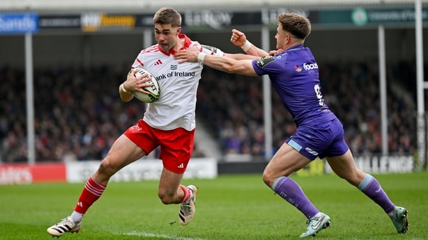 4 April 2026; Jack Crowley of Munster Rugby, despite the efforts of Steve Varney of Exeter Chiefs, on his way to scoring his side's first try during the EPCR Challenge Cup match between Exeter Chiefs and Munster at Sandy Park in Exeter, England. Photo by Paul Phelan/Sportsfile