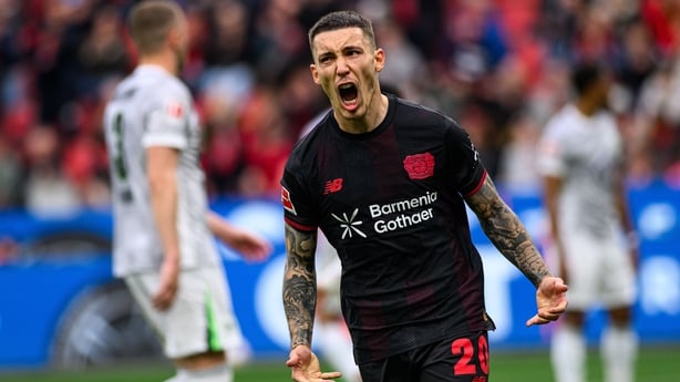 Alejandro Grimaldo of Bayer 04 Leverkusen celebrates first his goal during the Bundesliga match between Bayer 04 Leverkusen and VfL Wolfsburg at BayArena on April 4, 2026 in Leverkusen,