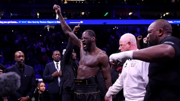 Deontay Wilder celebrates before having his hand raised following victory in heavyweight fight against Derek Chisora, April 2026