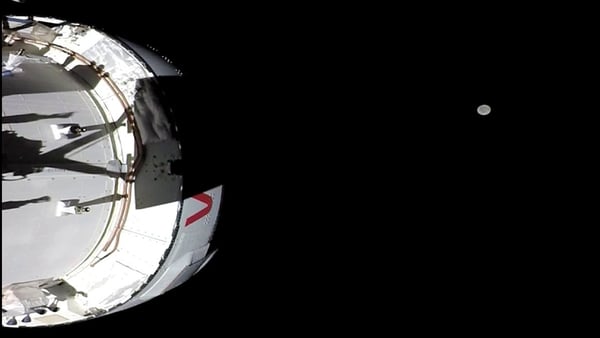 The Artemis Mission with the Moon in the distance